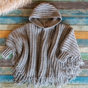 Lori Poncho Crochet Pattern: Hooded Fringe Design for Kids