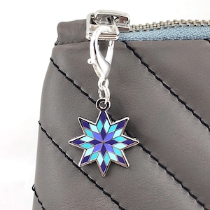 Tirador de cremallera con diseño de estrella llameante y diseño de lluvia morada / Dije de esmalte duro