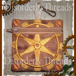 May include: A brown fabric zippered pouch with a gold embroidered gear design and the text "Disorderly Threads".