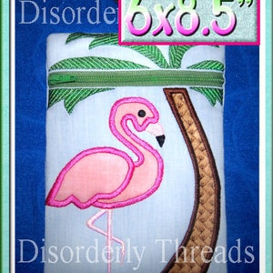 May include: A light blue zippered pouch with a pink flamingo and a brown palm tree design. The pouch has a green zipper and a palm tree design at the top. The text "Disorderly Threads" and "6x8.5" are visible.