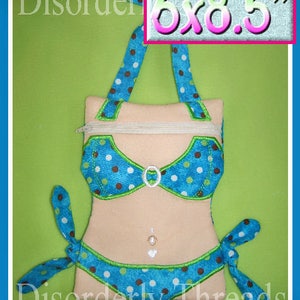 May include: A blue and brown polka dot bikini-shaped zippered pouch with a zipper closure and a brown strap. The pouch is 6x8.5 inches and has the text "Disorderly Threads" on the bottom.