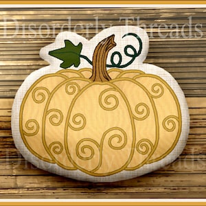 May include: A beige pumpkin with a green stem and brown leaves. The pumpkin is decorated with a swirl pattern in a darker shade of beige.