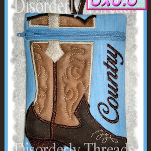 May include: A blue zippered pouch with a brown cowboy boot design and the word "Country" embroidered on the front. The pouch measures 6 by 8.5 inches.
