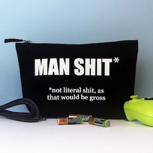 Sac de transport ou trousse de toilette Funny Man Shit - Choisissez la couleur de votre sac et du texte