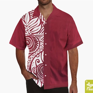 May include: A maroon short-sleeved button-up shirt with a white Polynesian-inspired design on the left side of the shirt.