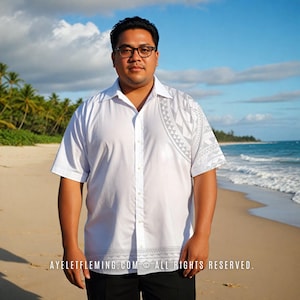 May include: White short-sleeved shirt with a gray geometric design on the right shoulder and bottom hem. The shirt is buttoned up and worn on a beach with palm trees and ocean in the background. The text "AYELETFLEMING.COM © ALL RIGHTS RESERVED." is at the bottom.