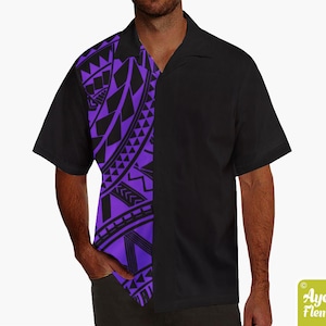 May include: A black and purple short-sleeved button-up shirt with a geometric pattern on the left side. The pattern is black on a purple background.