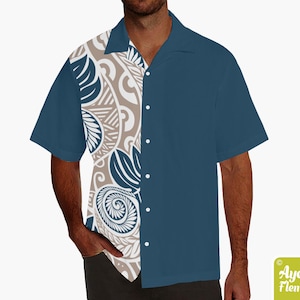 May include: A blue and beige patterned short-sleeved button-up shirt with a white collar.