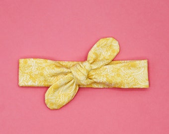 Ramo de onagra, diadema anudada para bebés