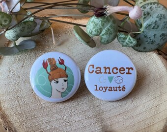 Round earrings with the astrological sign of Cancer
