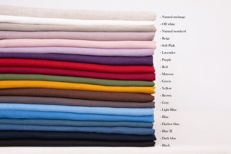 May include: A stack of 18 fabric swatches in various colors, including natural melange, off white, beige, soft pink, lavender, purple, red, maroon, green, yellow, brown, gray, light blue, blue, harbor blue, blue II, dark blue, and black.