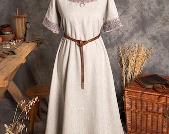 Linen light wide short-sleeved folk dress with geometriс embroidered hems inspired by early medieval, Slavic, Celtic and Viking mythology
