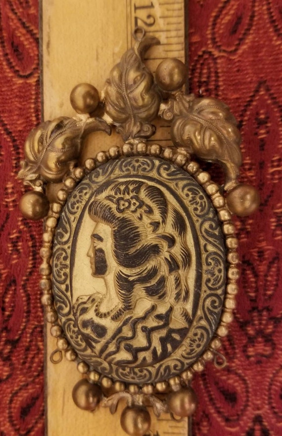 Amazing large, antique cameo pendant.