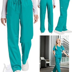 May include: Teal scrub pants featuring an elastic waistband with a drawstring closure, side pockets, and a straight-leg fit. The pants are shown from the front, back, and side, and are also displayed as part of a matching scrub set with a V-neck top.