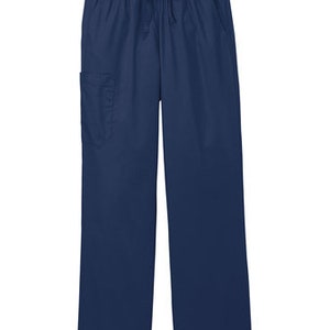 May include: Solid navy blue scrub pants featuring an elastic waistband with a matching drawstring tie. The pants include a single patch pocket on the right thigh and have a straight-leg cut, providing a functional and uniform appearance.