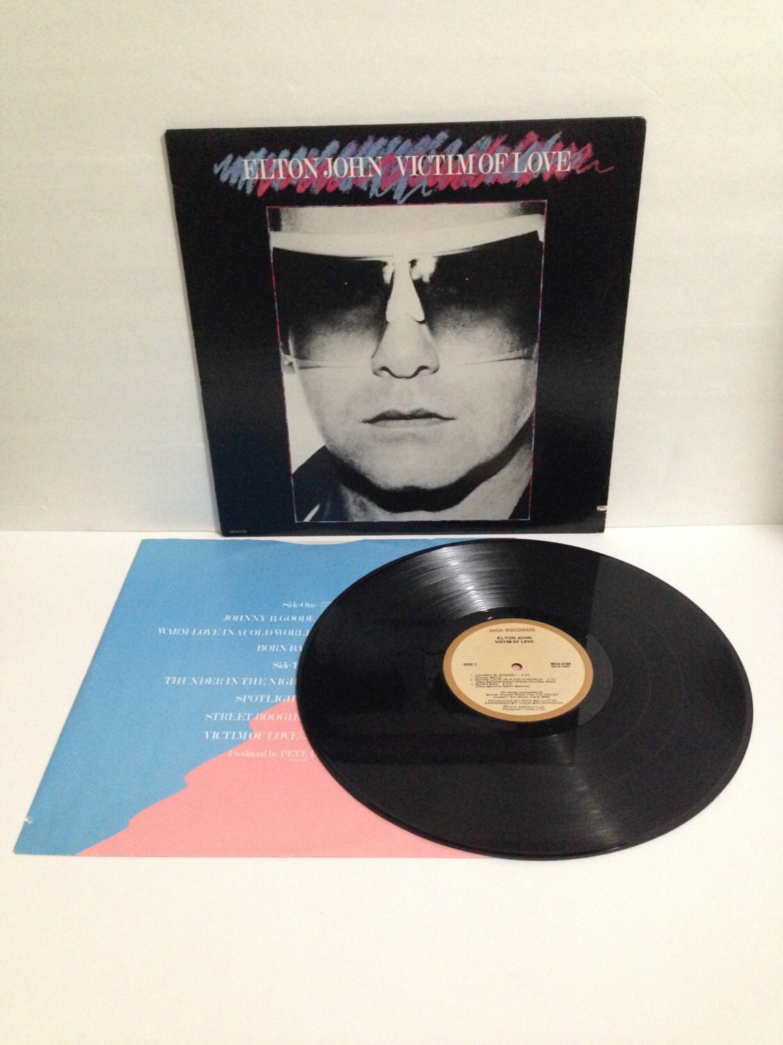 elton john album cover victim of love elton john album cover victim of love
