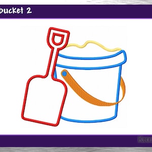 May include: A red plastic shovel and a blue plastic bucket with a yellow handle and a yellow lid. The bucket is filled with yellow sand. The image is titled "Sand bucket 2".