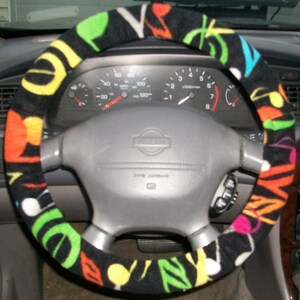 Steering wheel cover colorful music patterns on black