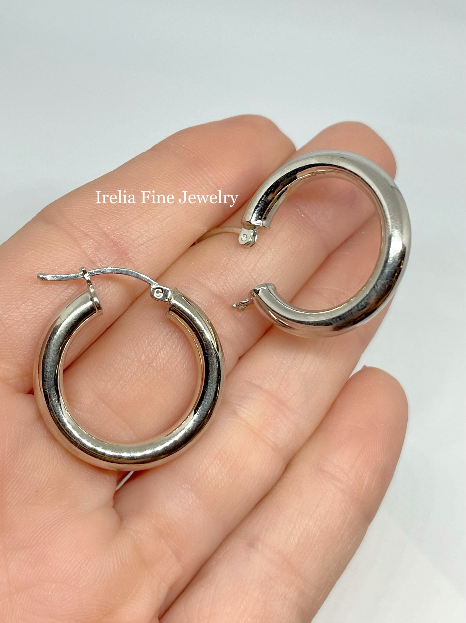 Rhodium-Plated Sterling Silver 4mm Width 4-Prong Set CZ 37mm Round Hoop Earrings Rhodium-Plated Sterling Silver 4mm Width 4-Prong Set CZ 37mm Round Hoop Earrings
