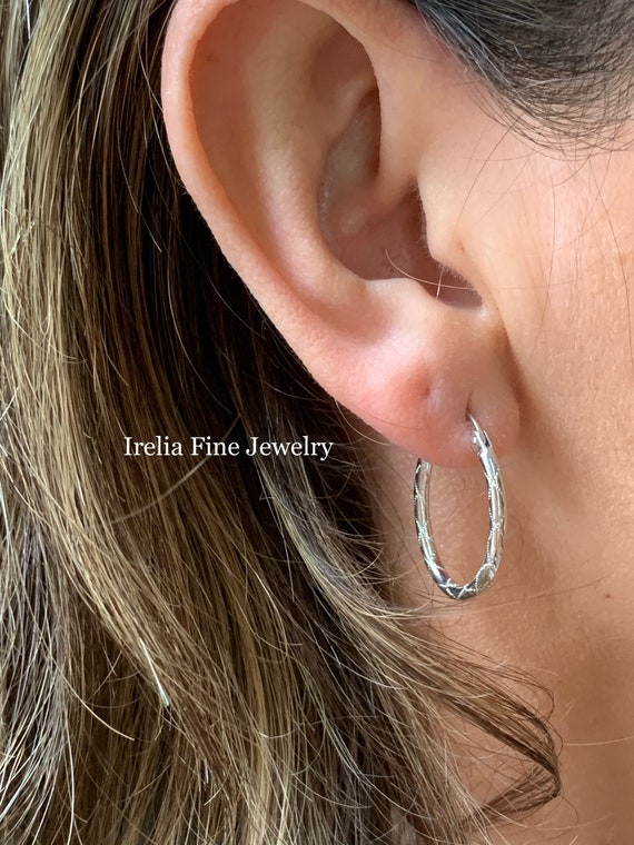 Decorative outlet hoop earrings