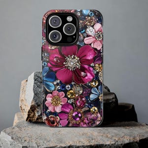 Bling glam bejeweled cell phone case for iPhone and Samsung style.