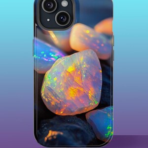 May include: A phone case with a close-up image of iridescent opals on a dark background.