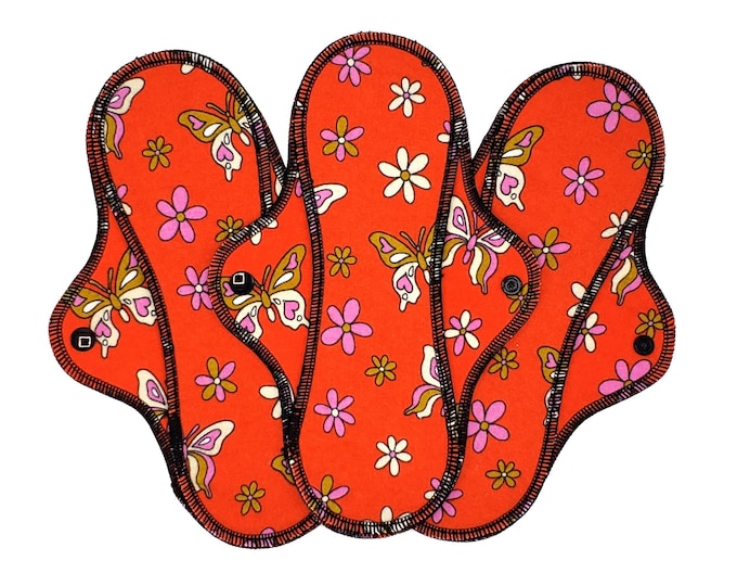Reusable Cloth Pad - Midi Pad For Regular Flow - Cotton Flannel - 8″ to 14″ - Butterflies On Red