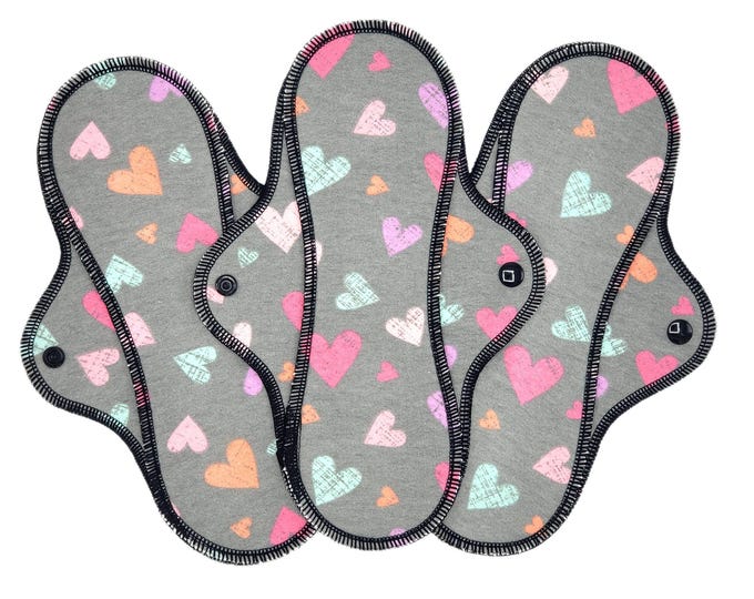 Reusable Cloth Pad - Midi Pad For Regular Flow - Cotton Flannel - 8″ to 14″ - Cute Hearts On Grey