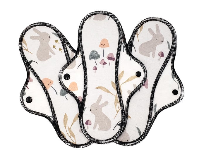 Organic Reusable Cloth Pad - Midi Pad For Regular Flow - Cotton Flannel - 8″ to 14″ - Bunnies