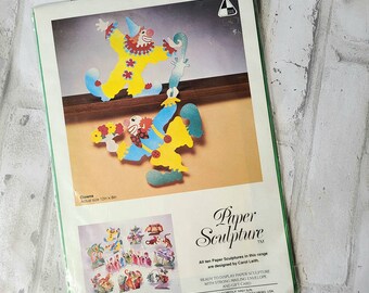 Carol Leith Paper Sculpture. Dynamic clown art in original packaging. 12" x 8". Monkeypuzzle. Paper art. Nursery decor.
