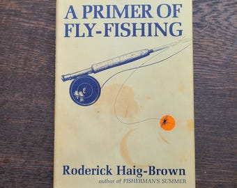 A Primer of Fly-Fishing. Roderick Haig-Brown. 1964 very good hardcover in fair- unclipped DJ.  Nature writer. Fishermen. Outdoorsmen.