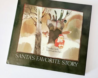 Santa book. Hisako Aoki "Santa's Favorite Story." Ivan Gantschev. Neugebauer Press. Hardcover 1982.  First Christmas. Forest animals.