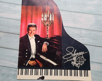 Signed Liberace die-cut concert program. 1960s-'70s. Vegas glamour. Keyboard. Classical music. Broadway. Concert collectible. Piano. Rosalie