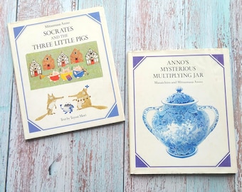 Anno's Mysterious Multiplying Jar" and "Socrates and the Three Little Pigs." Mitsumasa Anno. Math game. Folk tale. First US edition