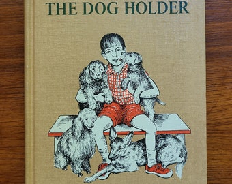 Eddie the Dog Holder. Very good Weekly Reader hardcover. Carolyn Haywood. Classic early reader. Animal story. Dog tales. 1960s-70s.