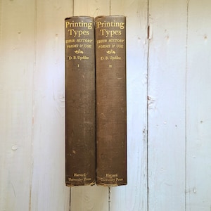 Printing Types: Their History Forms and Use. Hardcover 2 volume set. D.B. Updike. 1927 3rd printing. Typography. Typecasting. Metal type.