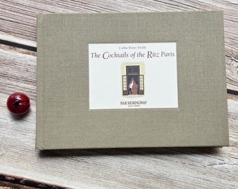 The Cocktails of the Ritz Paris. Bar Hemingway. Colin Peer Field.  VG 2003 hardcover 4th printing US edition. Bartending. Drink recipes