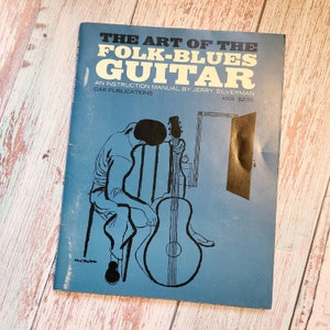 The Art of the Folk-Blues Guitar. Jerry Silverman. Softcover, staple-bound. 1964 edition. Photos David Gahr. Guitar lessons. Americana