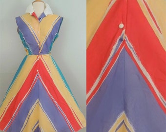Vintage 1950s full swing dress with rainbow stripes in chevron style pattern dolman sleeve