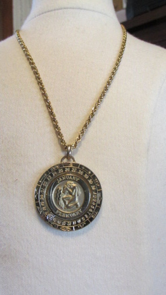 PIERRE CARDIN AQUARIUS Zodiac 1 1 8 Pendant 16 Chain 22K Gold