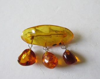 Vintage BALTIC AMBER BROOCH C Clasp Dangling Amber Accessories Fossilized Insects Evident Measures 1 1/4" x 1 1/2"  Collectible 1920's