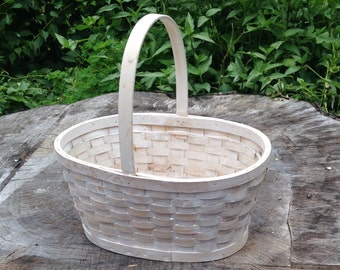 large white washed oval basket, plastic insert, 14.5" x 10.5" wide, 6" deep