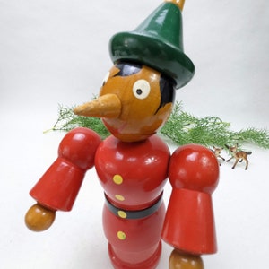 Hard to Find Wooden Pinocchio Piggy Bank with Movable Arms and Head,