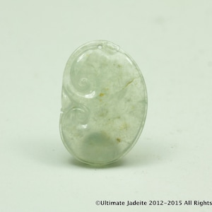 Jadeite Jade Pendant -- ICY Colorless with a little Characteristic (Grade A)