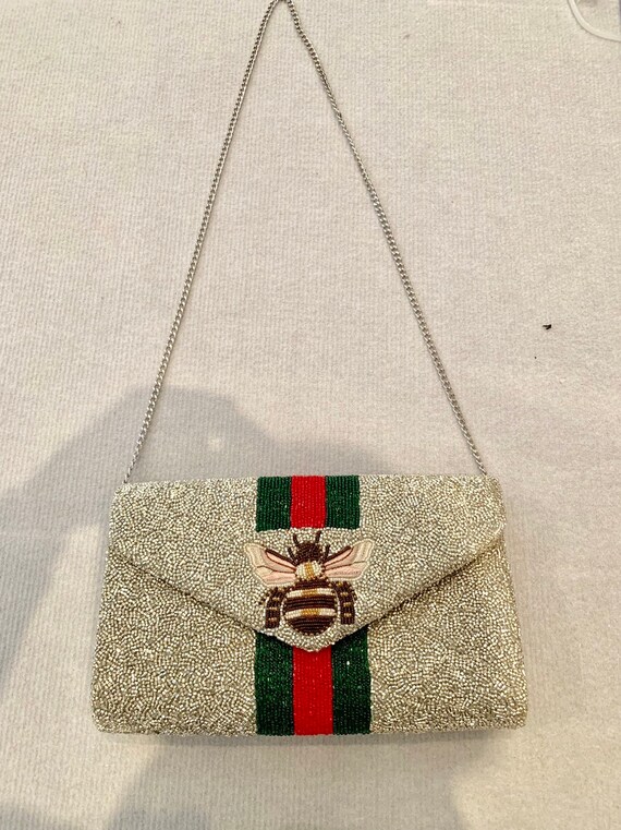 monogram beaded clutch