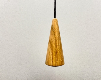 Cord pull or light pull handle made in oak wood in a tapered profile, size 80mm x 32mm