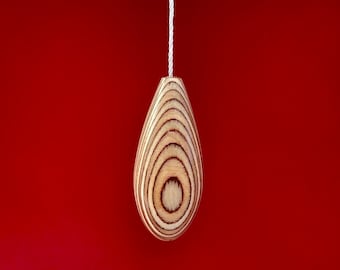 Light pull made in birch plywood in a teardrop shape, ergonomic light pull or cord pull great for anyone with dexterity issues.
