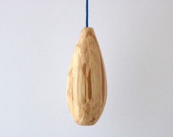 Light pull or cord pull made in beautiful flamed beech in a minimalist design, minimalist wooden elegance.