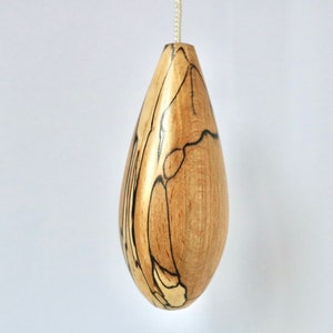 Light pull or cord pull in stunning spalted beech in a teardrop shape, curtain or blind cord weight.