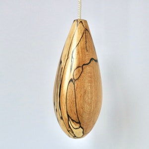 Cord pull or light pull in stunning Irish spalted beech in a minimalist teardrop design, Elegant and Functional Home accessory.